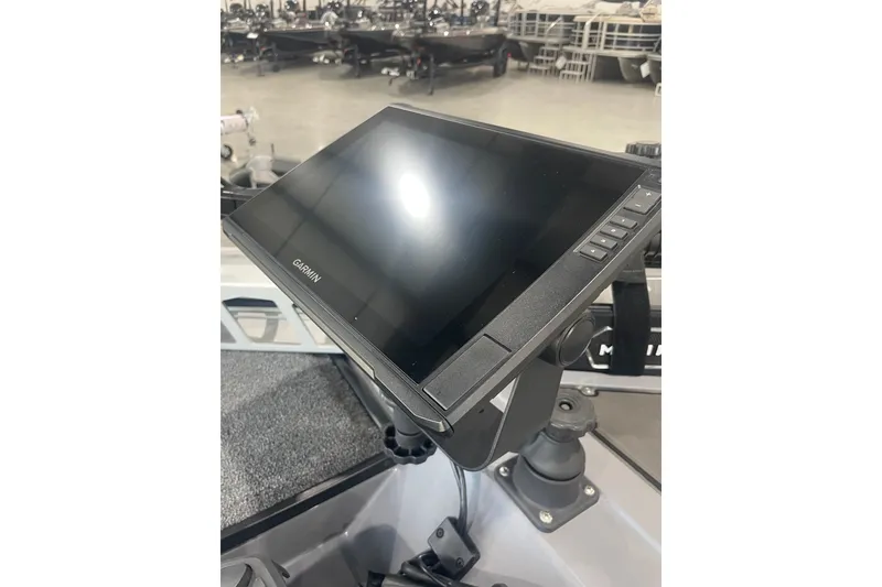 Slide: The Image of Garmin display on 2023 Triton 21 XrT boat, featuring advanced navigation technology. - 15