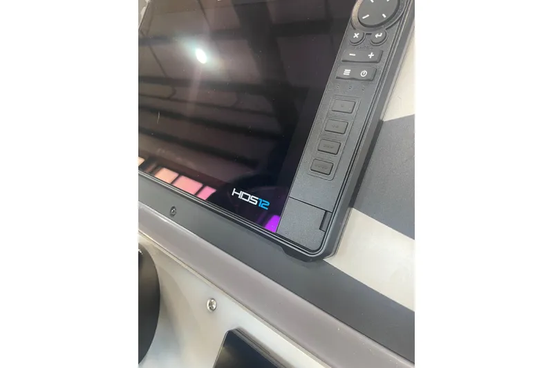 Slide: The Image of Close-up of 2023 Triton 21 XrT boat's HDS12 display panel. - 16
