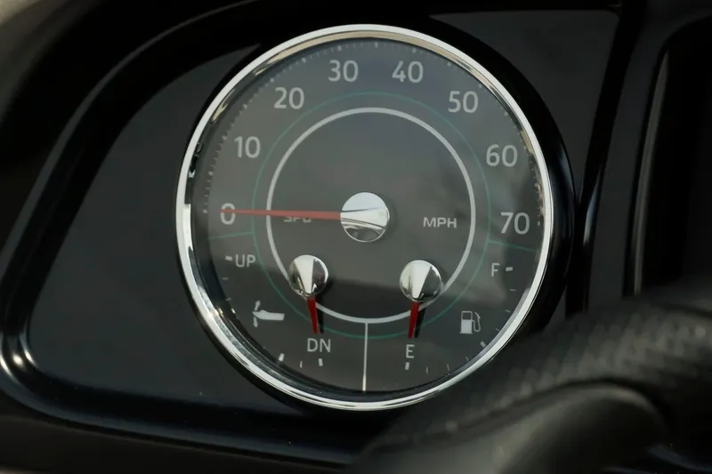 Slide: The Image of Dashboard gauge of 2026 Dockside 20 DQ, displaying speed and fuel levels. - 18