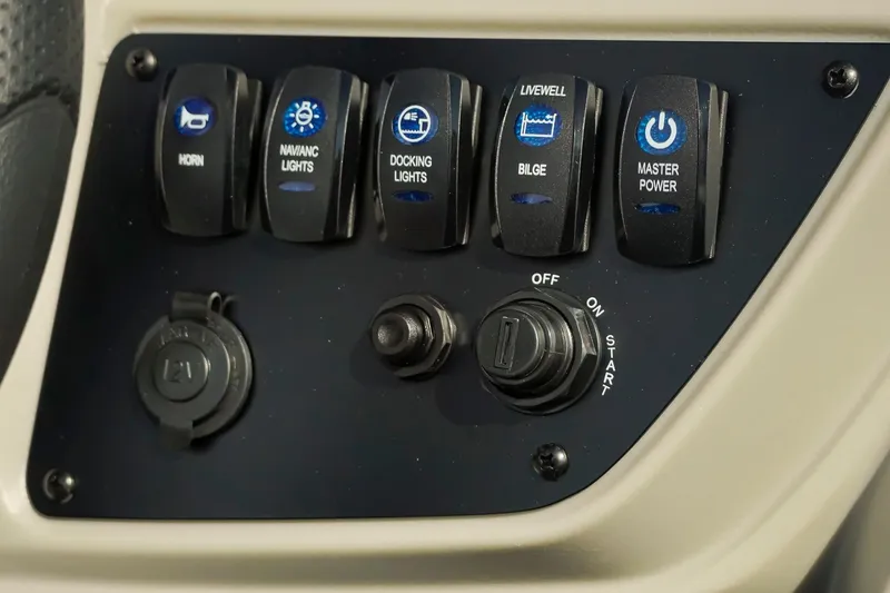 Slide: The Image of Control panel of 2026 Dockside 20 DQ boat with switches and ignition. - 19