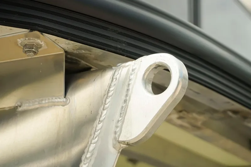 Slide: The Image of Close-up of Dockside 20 DQ 2026 boat's metal component with detailed welding. - 37