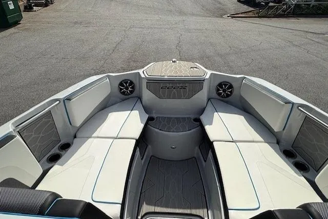 Slide: The Image of 2023 Yamaha Boats 222XE interior with spacious seating and modern design. - 11