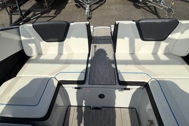 Slide: The Image of 2023 Yamaha Boats 222XE interior seating with modern design and comfortable upholstery. - 14