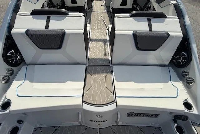Slide: The Image of 2023 Yamaha Boats 222XE interior with sleek seating and modern design. - 15