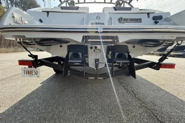 Slide: The Image of 2023 Yamaha Boats 222XE rear view, showcasing dual engines and "No Shoes" decal. - 7