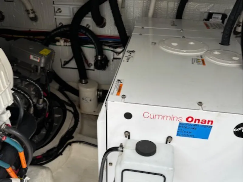 Slide: The Image of Engine room of 2017 Sabre 45 Salon Express with Cummins Onan generator. - 14