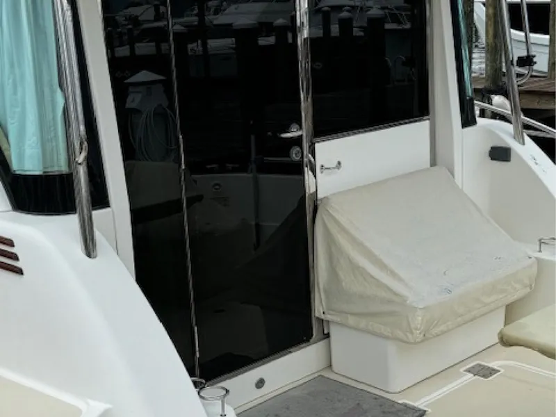 Slide: The Image of 2017 Sabre 45 Salon Express yacht with covered seating area. - 3