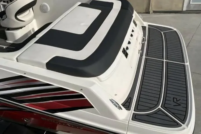 Slide: The Image of 2023 Bayliner VR5 Bowrider I/O boat with sleek design and spacious deck. - 4