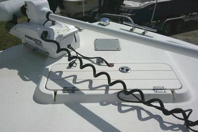 Slide: The Image of 2002 Parker 2501 Center Console boat with Minn Kota trolling motor on deck. - 15