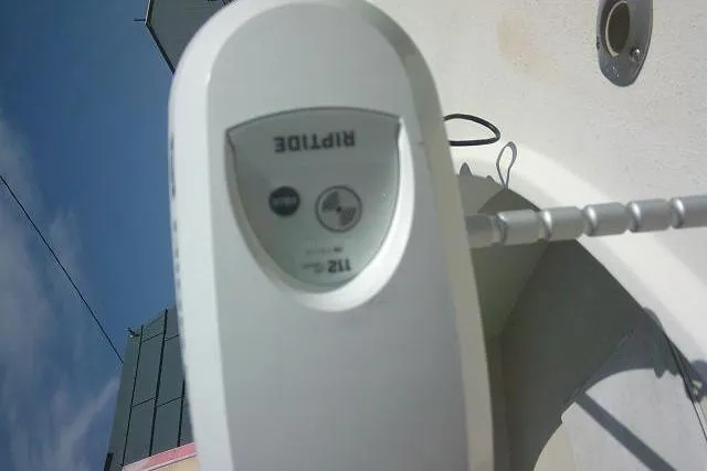 Slide: The Image of Close-up of a Riptide trolling motor on a 2002 Parker 2501 Center Console boat. - 19