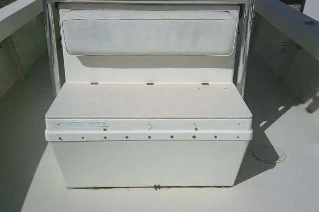 Slide: The Image of 2002 Parker 2501 Center Console boat seating and storage area. - 21