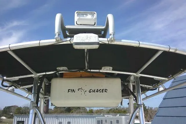 Slide: The Image of 2002 Parker 2501 Center Console boat with "Fin Chaser" label, viewed from below. - 23