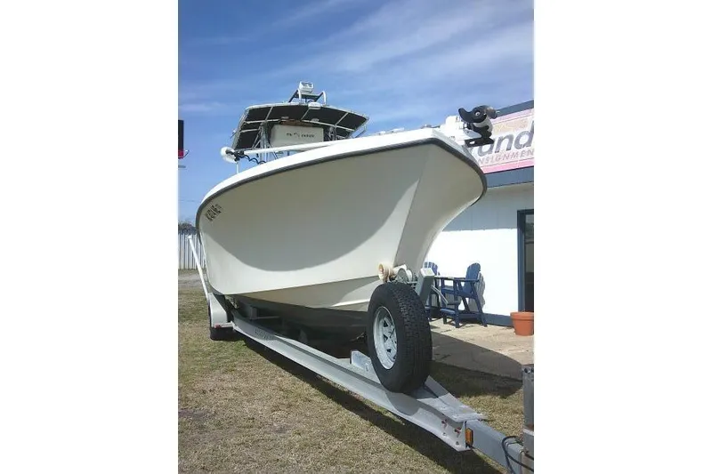 Slide: The Image of 2002 Parker 2501 Center Console boat on trailer, outdoor display. - 3