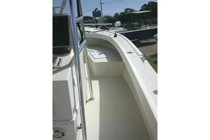 Slide: The Image of 2002 Parker 2501 Center Console boat interior, featuring spacious deck and seating area. - 40