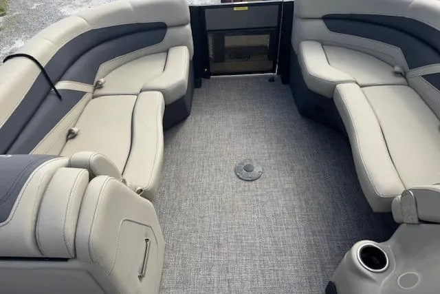 Slide: The Image of 2022 Barletta Cabrio 22UC pontoon boat interior with plush seating and modern design. - 12