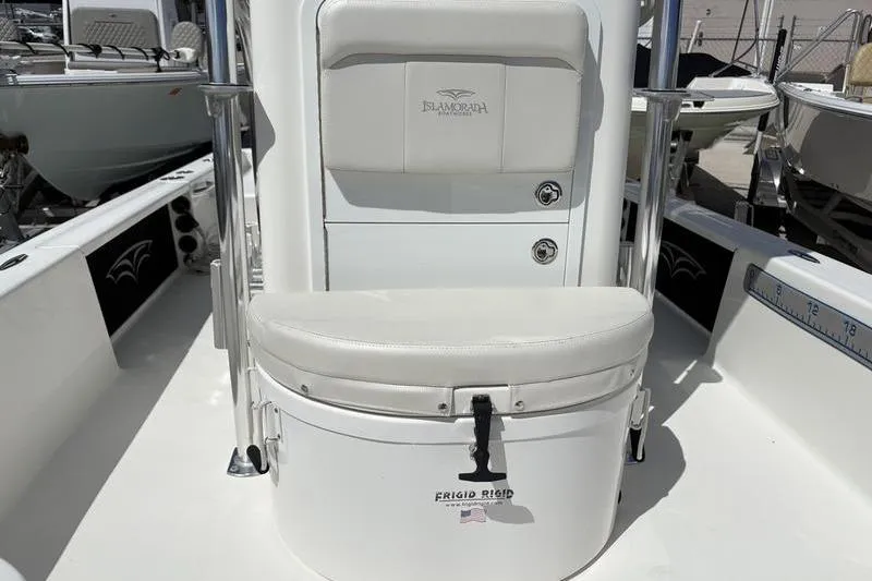 Slide: The Image of 2022 Islamorada 24 Morada boat interior with Frigid Rigid cooler seat. - 13