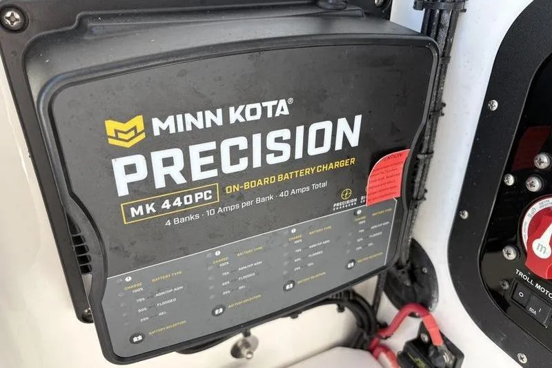 Slide: The Image of Minn Kota Precision MK 440PC on-board battery charger in 2022 Islamorada 24 Morada boat. - 17