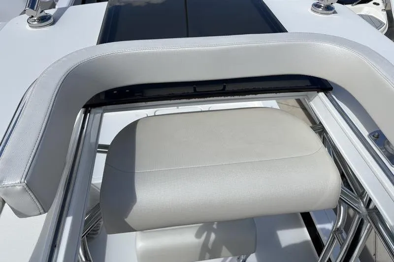 Slide: The Image of 2022 Islamorada 24 Morada boat seat with sleek white upholstery and modern design. - 24