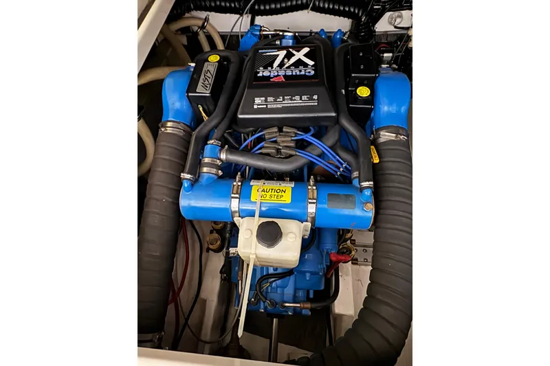 Slide: The Image of Bathroom of 1994 Tiara Yachts 3100 Open, featuring sink and toilet. - 41