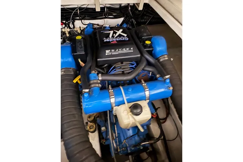 Slide: The Image of Bathroom interior of 1994 Tiara Yachts 3100 Open, featuring sink and toilet. - 42