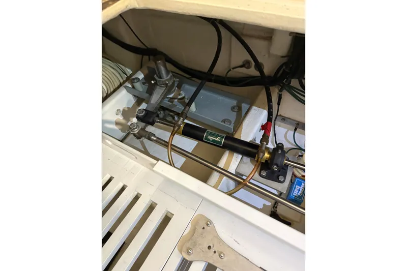 Slide: The Image of 1994 Tiara Yachts 3100 Open engine compartment detail with mechanical components. - 48