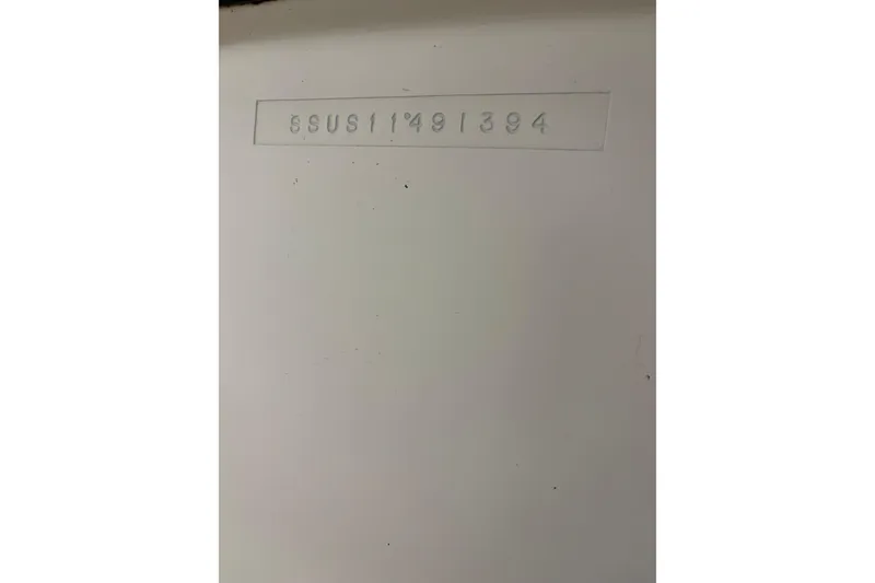 Slide: The Image of Hull identification number on 1994 Tiara Yachts 3100 Open. - 70