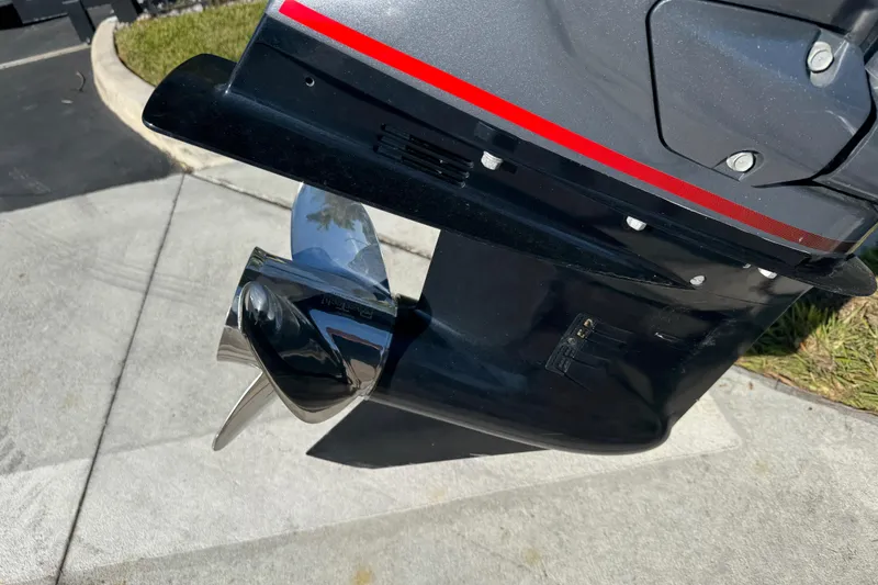 Slide: The Image of Close-up of 2025 Express H20 boat motor with shiny propeller. - 6