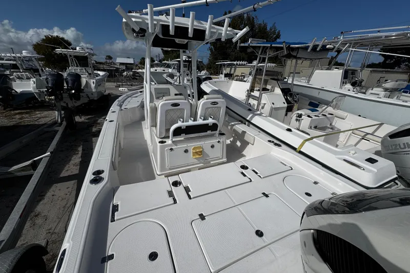 Slide: The Image of 2021 Blue Wave 2600 PureBay boat with spacious deck and modern features. - 6