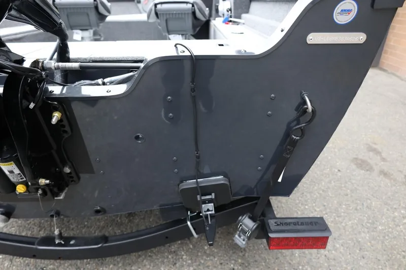 Slide: The Image of 2026 Lund 1650 Angler SS boat transom with trailer attachment and motor mount. - 9