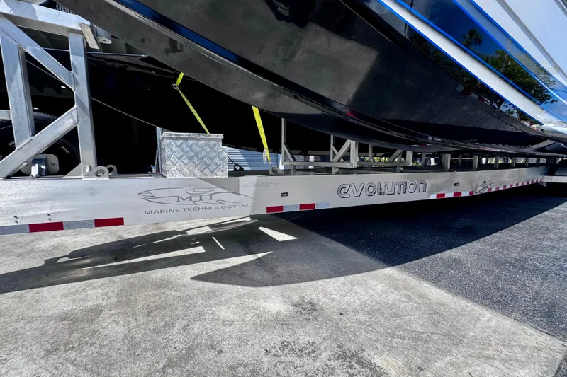 Slide: The Image of Trailer for 2025 MTI 440 boat, featuring "Evolution" branding and Marine Technology Inc. logo. - 6