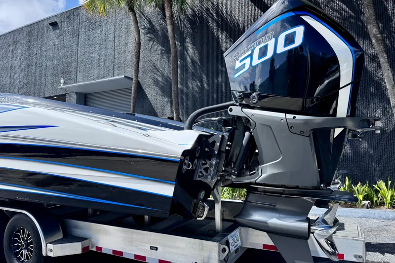 Slide: The Image of 2025 MTI 440 boat with Racing 500 engine on a trailer. - 7