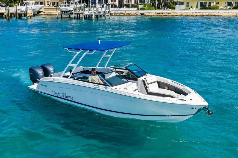 The Image of 2022 Cobalt R8 Outboard boat cruising on clear blue water. - 0