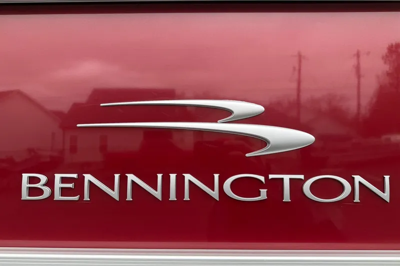 Slide: The Image of Bennington 22 SX Quad Bench 2023 logo on red background. - 12