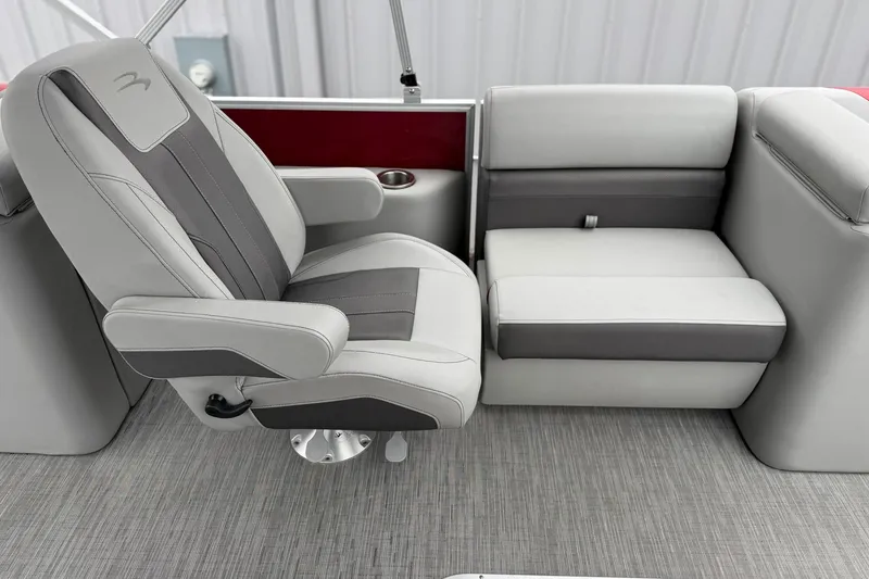 Slide: The Image of 2023 Bennington 22 SX Quad Bench with gray and black seating, modern design. - 5