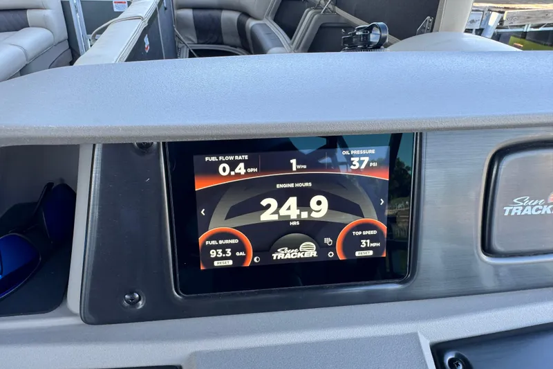 Slide: The Image of Dashboard of 2024 Sun Tracker Party Barge 24 DLX showing engine metrics. - 12
