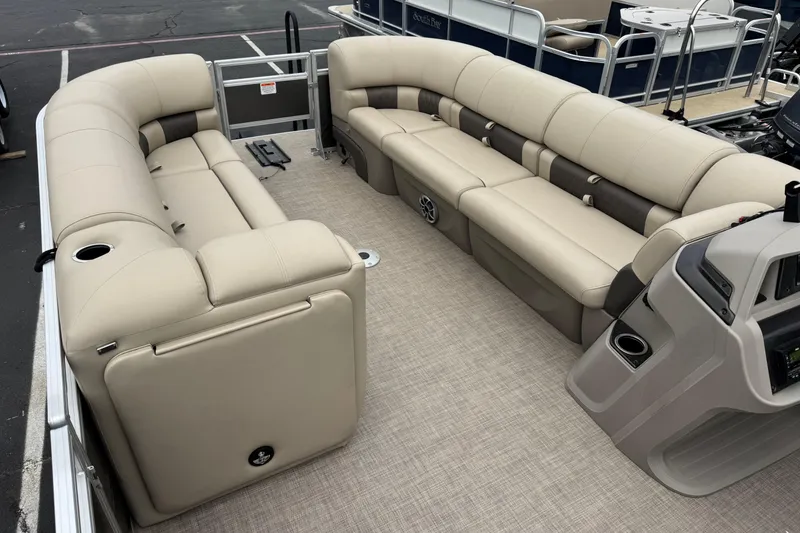 Slide: The Image of 2024 Sun Tracker Party Barge 24 DLX interior with spacious seating and modern design. - 4