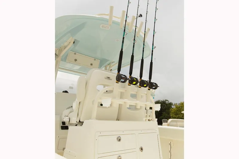 Slide: The Image of Manufacturer Provided Image: 2017 Cobia 277 Center Console with fishing rods on rod holders. - 16