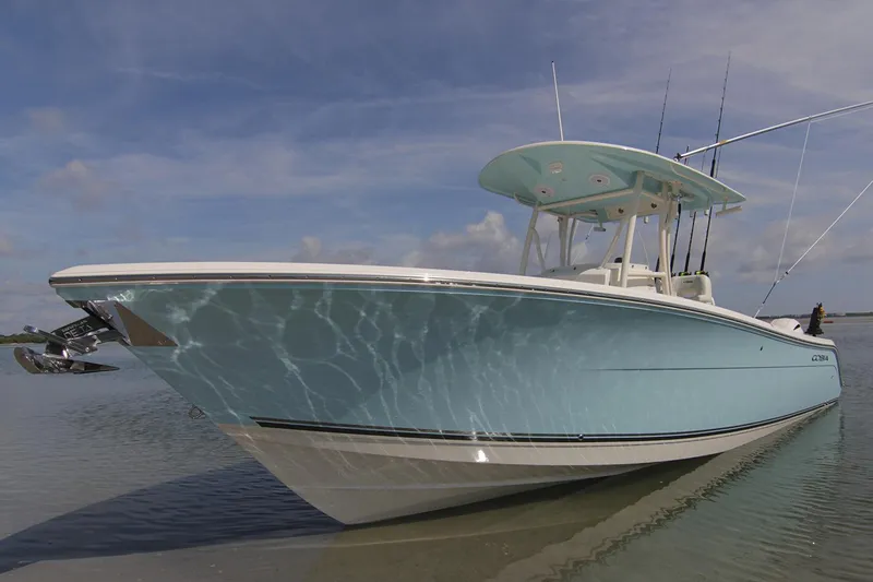 Slide: The Image of Manufacturer Provided Image: 2017 Cobia 277 Center Console boat on calm water. - 8