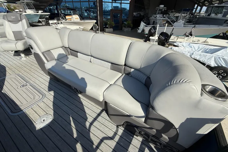 Slide: The Image of Luxurious seating on 2020 Ranger 2300LS boat, featuring plush gray upholstery and spacious design. - 14