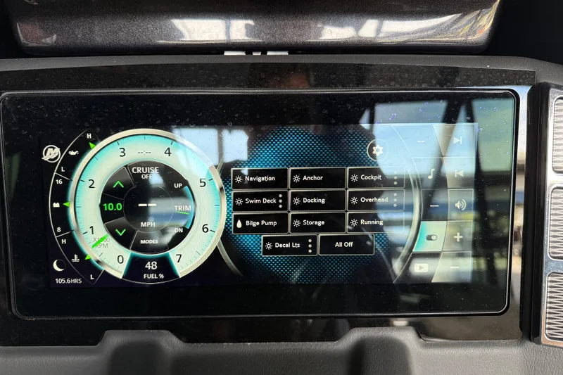 Slide: The Image of Dashboard of a 2020 Ranger 2300LS boat with digital controls and speedometer display. - 21