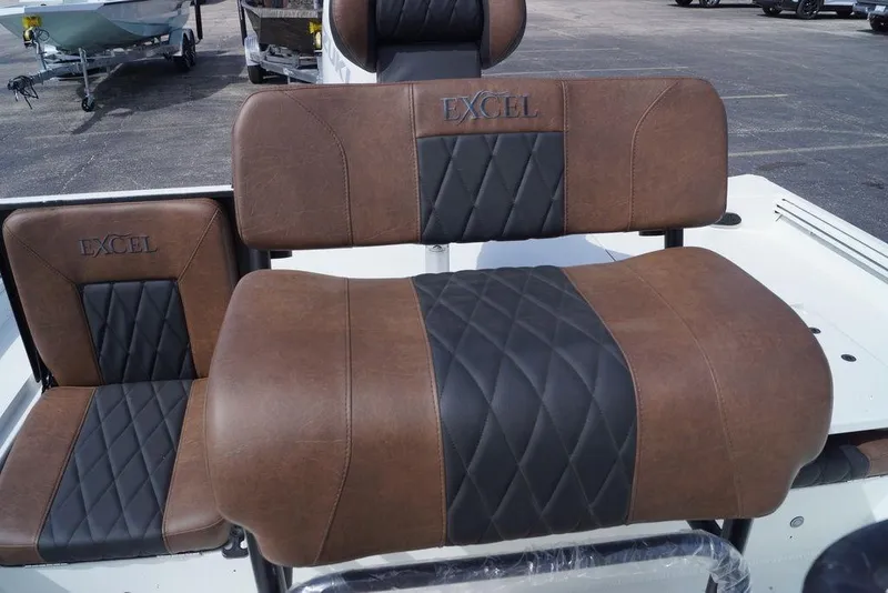 Slide: The Image of 2026 Excel 230 Bay Pro Elite boat seats with brown and black diamond stitching. - 15