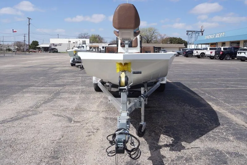 Slide: The Image of 2026 Excel 230 Bay Pro Elite boat on trailer in parking lot. - 25