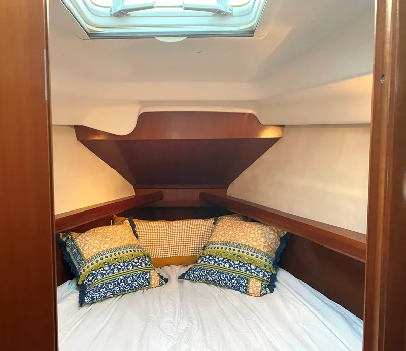 Slide: The Image of Interior view of 2005 Beneteau 323 yacht with control panel. - 17