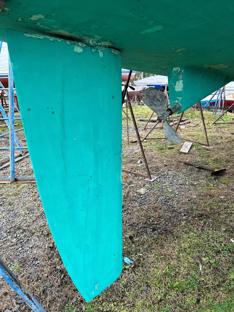 Slide: The Image of Engine compartment of a 2005 Beneteau 323 sailboat. - 22