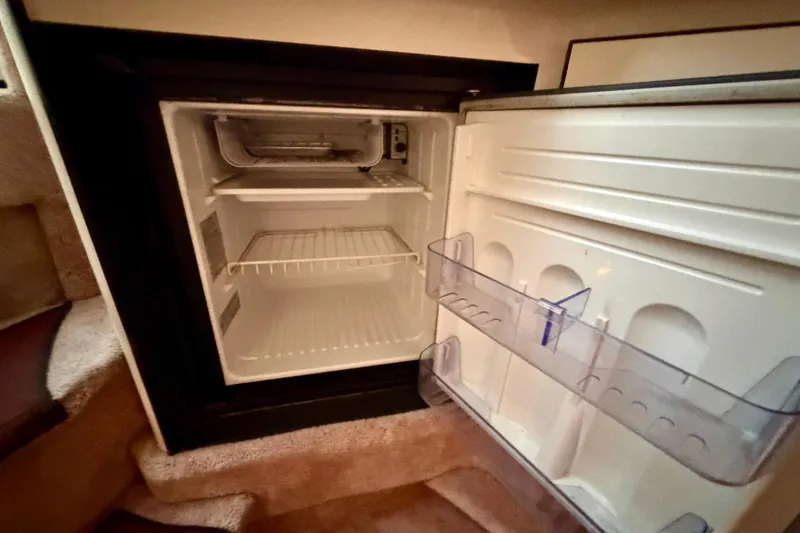 Slide: The Image of Open refrigerator inside 1995 Sea Ray 380 Sun Sport boat cabin. - 29