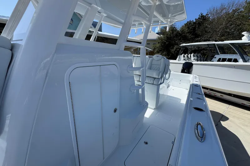 Slide: The Image of 2026 Invincible 33 Catamaran interior with sleek seating and modern design. - 25