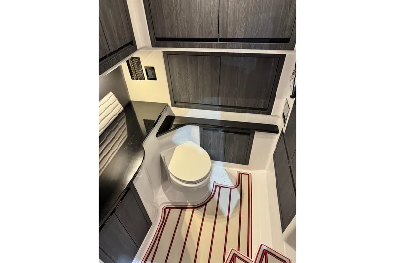 Slide: The Image of Luxurious bathroom interior of 2024 Cigarette 41' Nighthawk SD Edition boat. - 16