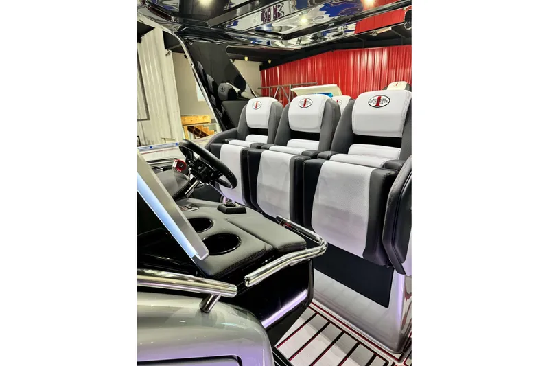 Slide: The Image of 2024 Cigarette 41' Nighthawk SD Edition interior with sleek seating and modern design. - 4