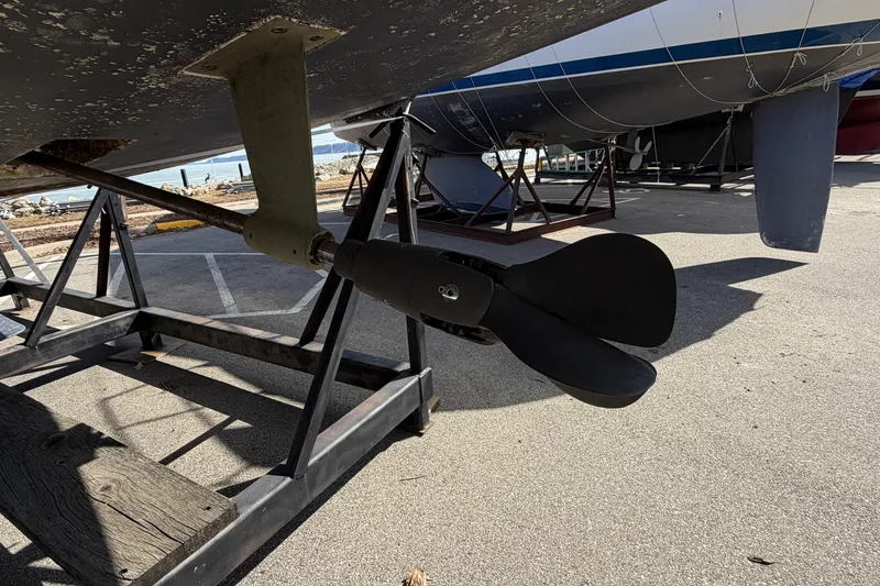Slide: The Image of Propeller of a 2005 Hunter 38 sailboat on a stand in a boatyard. - 11