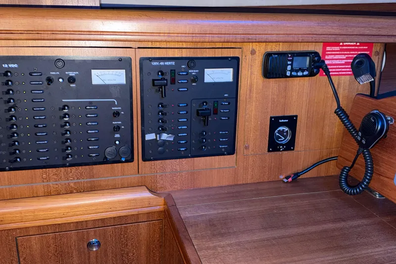 Slide: The Image of Control panel of a 2005 Hunter 38 sailboat with communication equipment. - 15